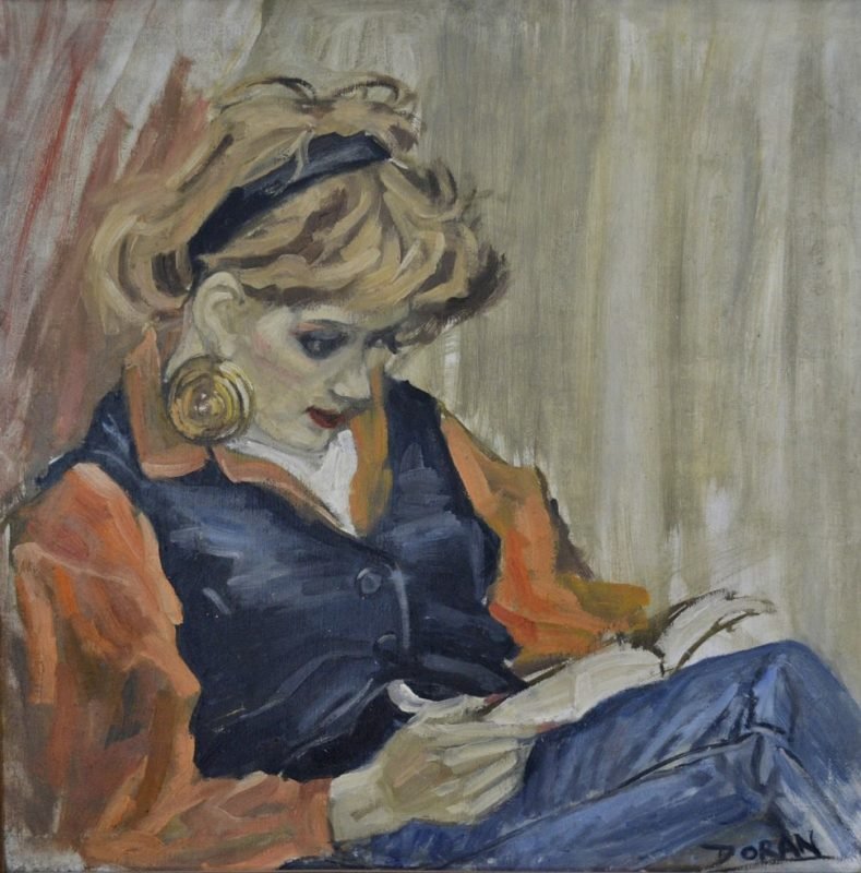 Lady with large earrings, sitting and reading